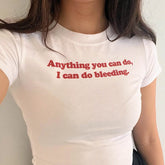 Anything You Can Do, I Can Do Bleeding” Baby Tee – Color White