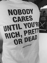 “NOBODY CARES” Statement T-Shirt – Bold & Edgy Oversized Graphic Tee