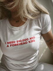 I Need $10,000 and a Forehead Kiss” Baby Tee – Trendy Statement Color White