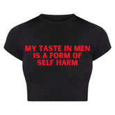 Edgy Black Baby Crop Top – “My Taste in Men” Baby Tee