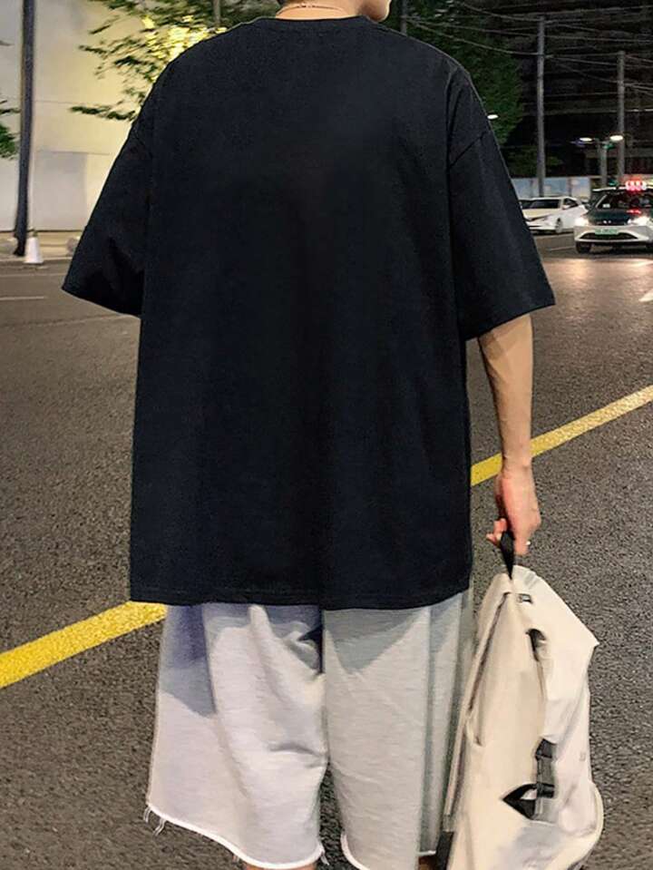 Trendy Black Oversized T-Shirt with Unique Hand Print – Streetwear Style Color Black