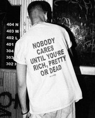 “NOBODY CARES” Statement T-Shirt – Bold & Edgy Oversized Graphic Tee